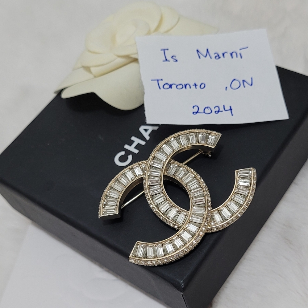 Chanel brooch with receipt